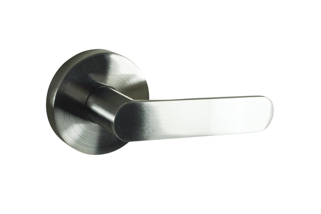 Image of the Brushed Nickel Nidus Spring Door Lever Round Passage Set on a white background.
