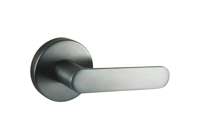 Image of the Graphite Grey Nidus Spring Door Lever Round Passage Set on a white background.