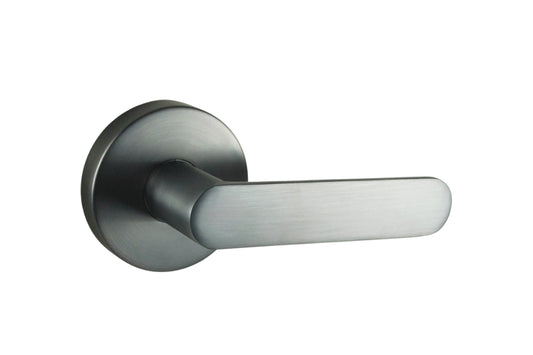 Image of the Graphite Grey Nidus Spring Door Lever Round Passage Set on a white background.
