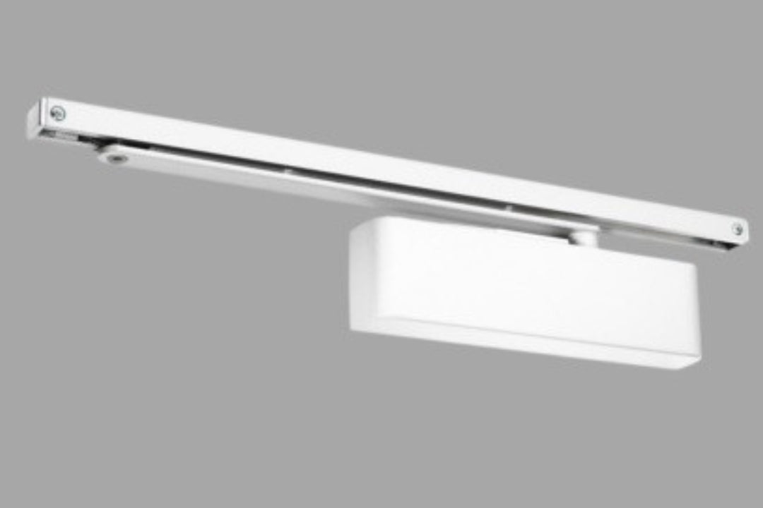 Product picture of the White Door Closer with Slide Arm on a grey and white background.